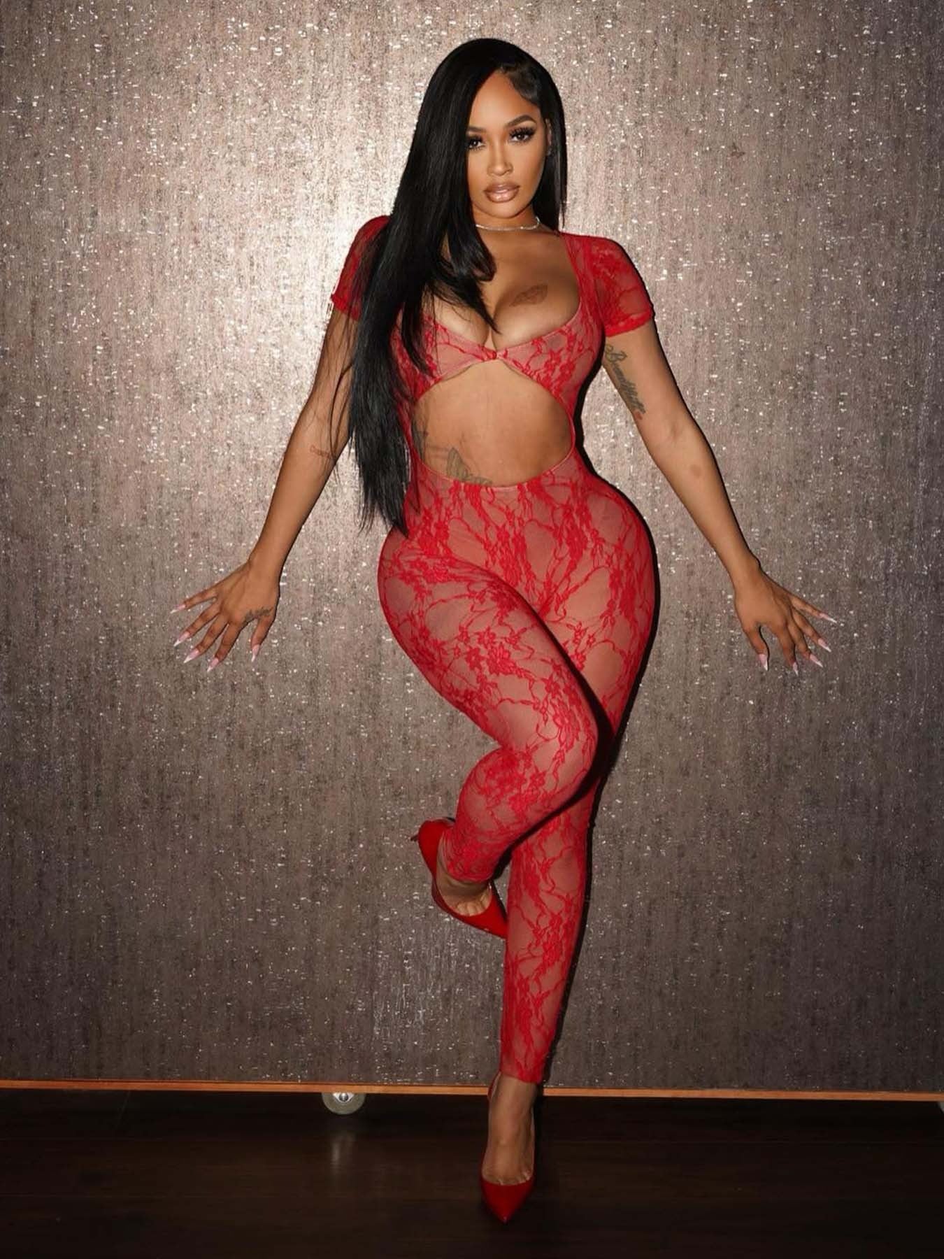 Sexy lace sleeves and navel-baring jumpsuit trousers