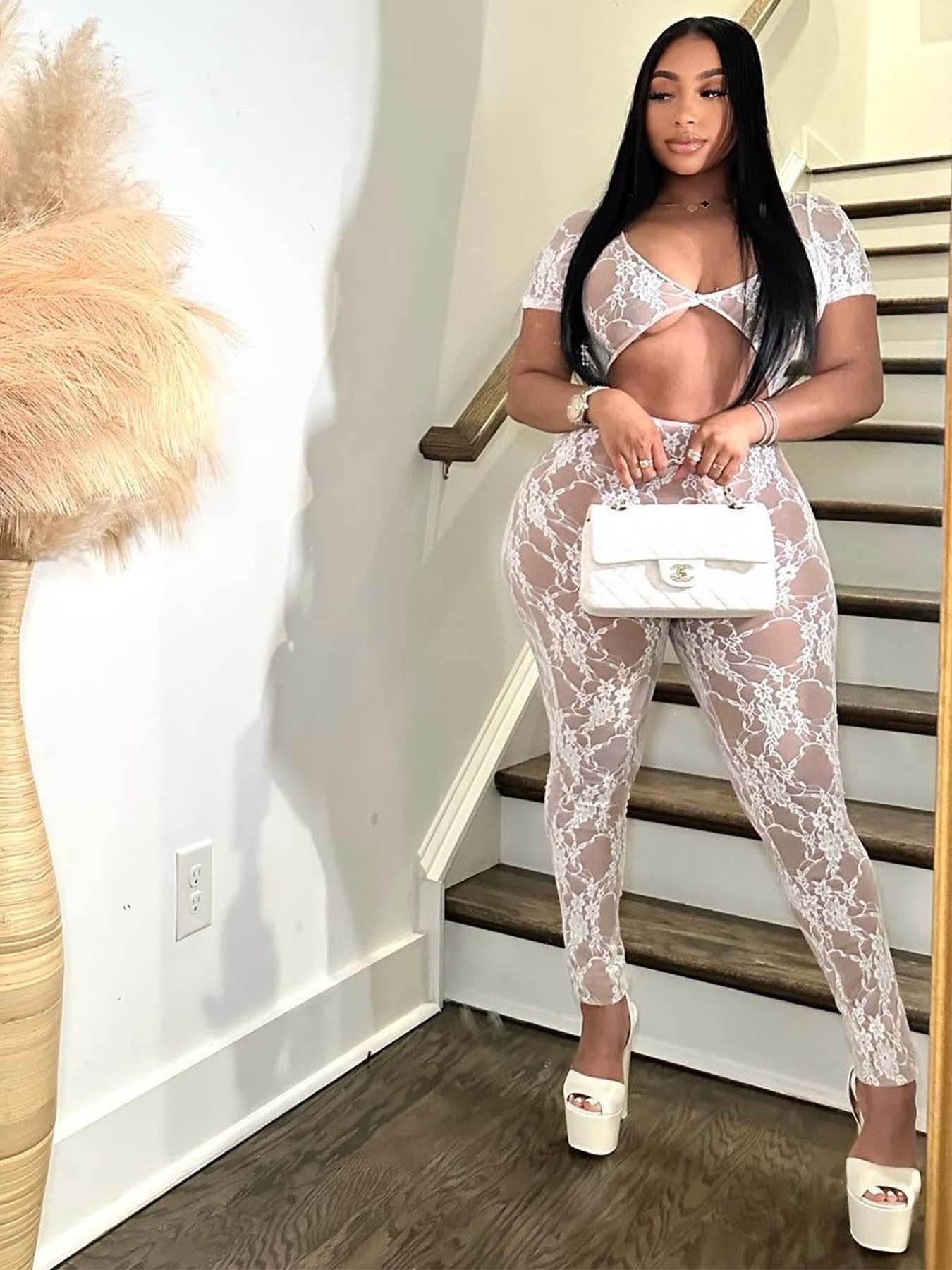Sexy lace sleeves and navel-baring jumpsuit trousers