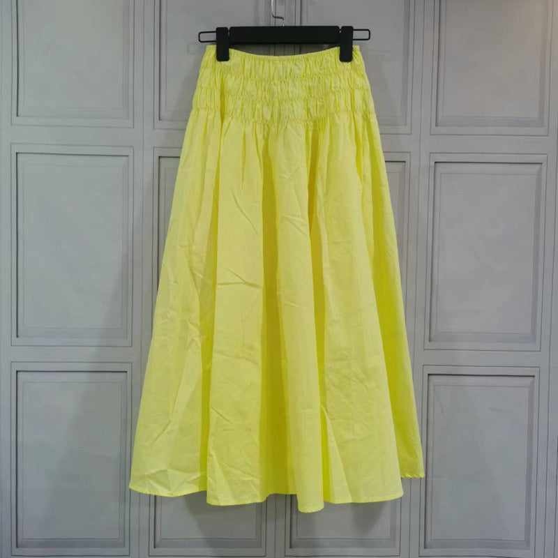 Romantic cheese yellow exposed navel strap A-line slimming pleated skirt