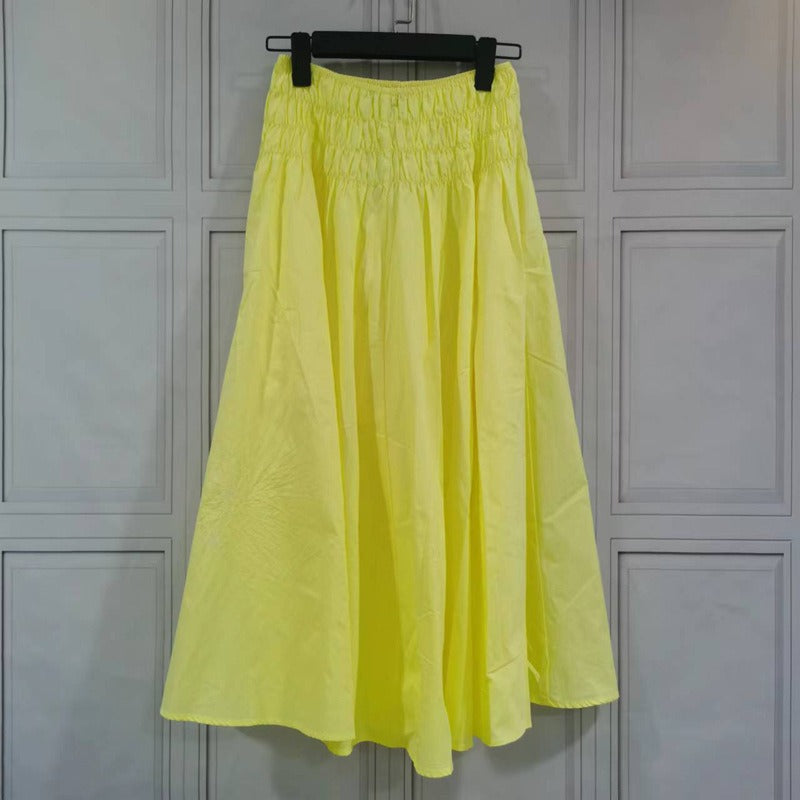 Romantic cheese yellow exposed navel strap A-line slimming pleated skirt