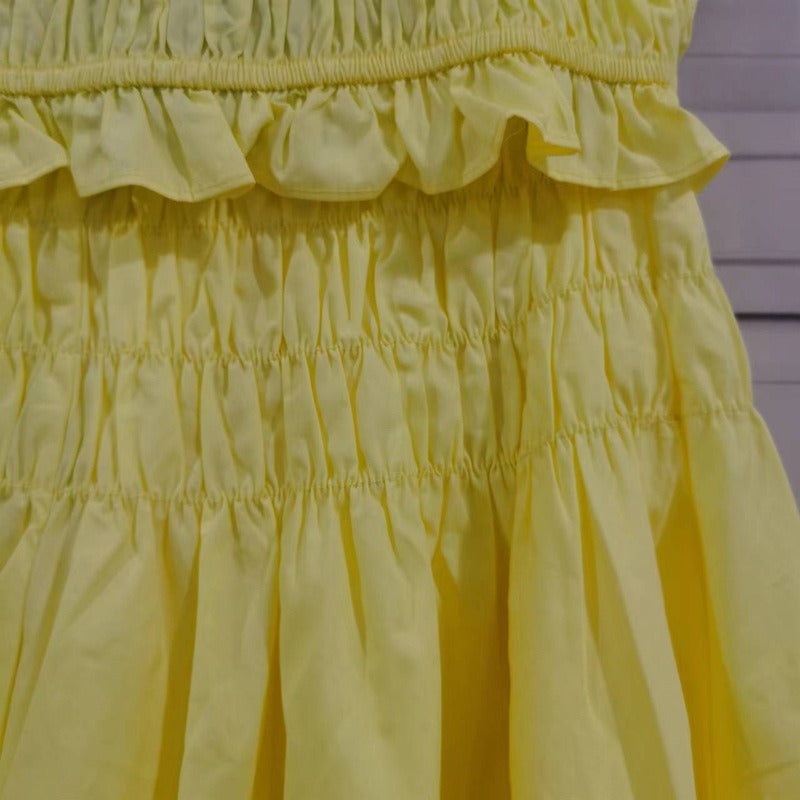 Romantic cheese yellow exposed navel strap A-line slimming pleated skirt